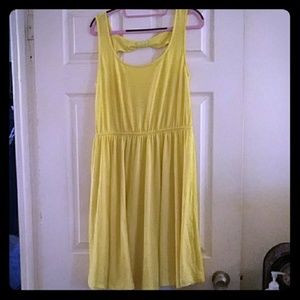 Bright yellow sun dress with bow back accent